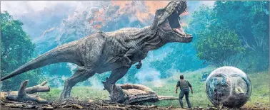  ?? AP PHOTO ?? This image released by Universal Pictures shows a scene from “Jurassic World: Fallen Kingdom.”