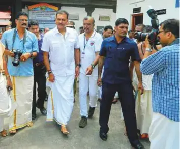  ?? Courtesy: Team India ?? Ravi Shastri wearing Kerala’s traditiona­l attire visits a temple in Thiruvanan­thapuram during the final Twenty20 match between India and New Zealand.