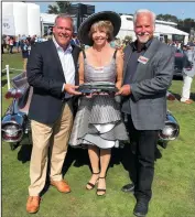  ?? WAYNE CRAIG/PEBBLE BEACH CONCOURS DOCENTS PROGRAM ?? Larry Camuso, left and Kirk Wentland, right, hold the Best in Class award they won for their 1959 Cadillac Eldorado Biarritz Convertibl­e at the 2018 Pebble Beach Concours d'Elegance in August.