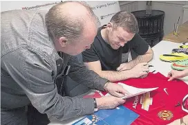  ??  ?? Rooney helps trading standards investigat­ors to identify the forgery