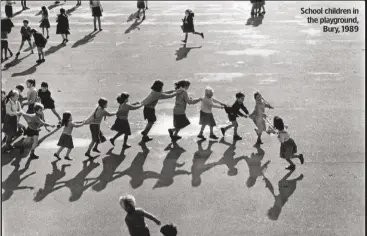  ??  ?? School children in the playground, Bury, 1989