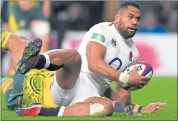  ??  ?? Joe Cokanasiga scores England’s third try against Australia