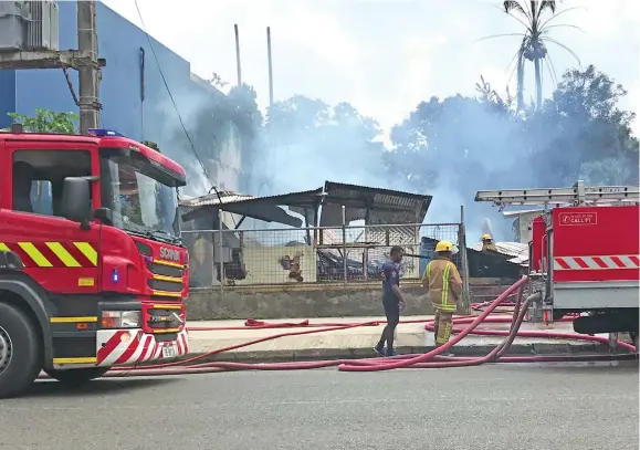  ?? Photo: Ashna Kumar ?? Firefighte­rs after dousing the fire in Nausori on February 17, 2018