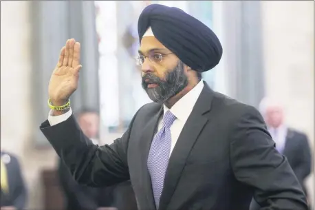  ?? CHRIS PEDOTA/THE RECORD VIA AP ?? FILE - In this Jan. 16, 2018, file photo, Gurbir Grewal is sworn in before testifying in front of the senate judiciary committee in Trenton, N.J.