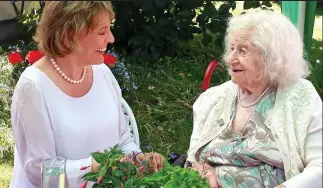  ??  ?? Record-breaker: Anne Baker, 106, with Dame Esther Rantzen