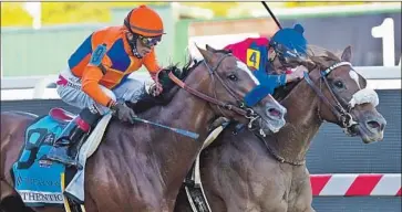  ?? SWISS SKYDIVER, Nick Wass Associated Press ?? right, and jockey Robby Albarado battle Kentucky Derby winner Authentic and John Velazquez down the stretch in the Preakness. It was the second-fastest time in race history: 1:53.10.