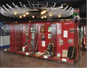  ??  ?? The award-winning exhibition space of the Ted Knight Saskatchew­an Hockey Hall of Fame includes a chandelier of hockey sticks.