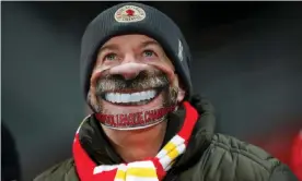  ??  ?? Klopp masks, essential kit at Anfield. Photograph: Clive Brunskill/Reuters