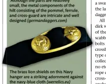  ?? ?? The brass lion shields on this Navy hanger are a striking adornment against the navy-blue cloth (werrelics.eu)