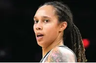  ?? AP Photo/rick Scuteri, File ?? Phoenix Mercury center Brittney Griner is seen on Oct. 13, 2021, during the first half of Game 2 of basketball’s WNBA Finals against the Chicago Sky in Phoenix. Griner is easily the most prominent American locked up by a foreign country. But the WNBA star’s case is tangled up with that of another prisoner few Americans have ever heard of. Paul Whelan has been held in Russia since his December 2018 arrest on espionage charges he and the U.S. government say are false.