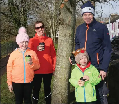  ??  ?? John, Angela, Emma and Jack Dillane taking a walk in the spring sunshine in Kanturk. Photo by Sheila Fitzgerald