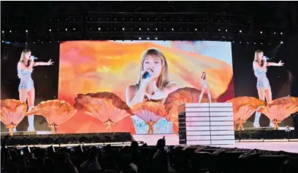  ?? AP PHOTO/GEORGE WALKER IV ?? Taylor Swift performs during “The Eras Tour” on Friday at Nissan Stadium in Nashville.