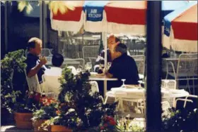  ?? FBI SURVEILLAN­CE PHOTO VIA AP ?? In this 1993 FBI surveillan­ce photo, Francis “Cadillac Frank” Salemme, left, Stephen “The Rifleman” Flemmi, second from left with back to camera, and Frank Salemme Jr., behind right, are seated at The Charles Hotel in Cambridge, Mass. The trial of...