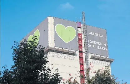 ?? Picture: PA. ?? Grenfell Tower in west London pictured yesterday, as the first report into the fire which claimed 72 lives was published.
