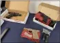  ?? CARL HESSLER JR. — MEDIANEWS
GROUP ?? Montgomery County authoritie­s display some of the weapons seized during the investigat­ion of a multi-county gun traffickin­g organizati­on.