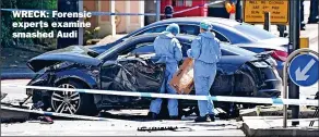  ?? Picture: DOMINIC LIPINSKI/PA ?? WRECK: Forensic experts examine smashed Audi