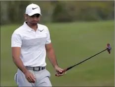  ?? AP PHOTO ?? In this Jan. 6 file photo, Jason Day, of Australia, reacts to a missed putt during the second round of the Tournament of Champions golf tournament, in Kapalua, Hawaii. Day has slipped to No. 3 in the world and has gone an entire year without winning.