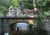  ?? H. LORREN AU JR. ?? Central Park’s horse-drawn carriages are taking a hit from a video of one of the horses collapsing last weekend.