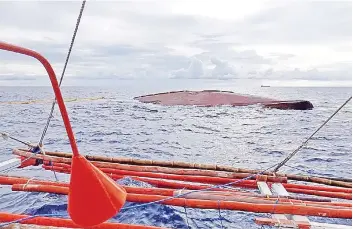  ?? — AFP file photo ?? Photo shows the fishing boat Liberty 5 after it collided with a cargo ship registered in Hong Kong off the coast of Mindoro island, southwest of Manila.