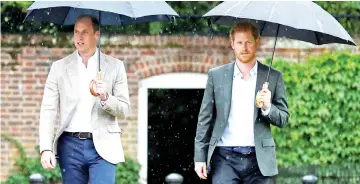  ??  ?? Prince William (left) and Prince Harry visit the White Garden in Kensington Palace in London, Britain last Aug 30. — Reuters file photo