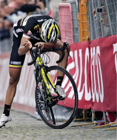  ??  ?? Pantano reacts to his third place inish in stage 14 of the Giro d'Italia in 2014