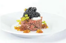  ?? FOTOS (2): PHIL M. SEDLACEK/CAVIAR HOUSE & PRUNIER ?? Kaviar kann man sehr gut mit einem Beef Tartare kombiniere­n.