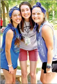  ?? Photo submitted ?? Campers Kendall Hays of Winslow and Landry Lichty of West Fork pose with Camp Siloam staff member Jordan Hunt.