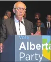  ?? Canadian Press photo ?? Alberta Party Leader Stephen Mandel, with nominated candidates standing behind him, speaks to members at the party’s annual general meeting in Edmonton on Saturday.
