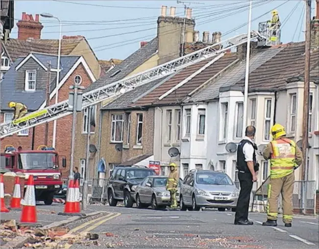  ?? Picture: Mike Pett ?? Emergency services conducted a joint operation to make the town’s roads safe after the earthquake left many homes unstable