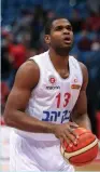  ?? (Udi Zitiat) ?? HAPOEL JERUSALEM center Ronald Roberts had 14 points and 15 rebounds in last night’s 88-86 win over Hapoel Holon at the Jerusalem Arena.