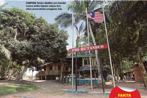  ??  ?? KAMPUNG Tanduo dijadikan pos kawalan tentera ketika tinjauan selepas lima tahun penceroboh­an pengganas Sulu.