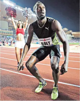  ??  ?? Perfect pose: Usain Bolt reacts to his 100m triumph last night