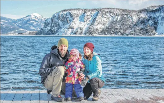  ?? SUBMITTED PHOTO ?? Kristen Hickey, seen here with her husband Robbie and two-year-old daughter Claire, poses for a photo on the dock of Gros Morne Adventures, the business she has purchased in Norris Point.