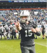  ??  ?? Pine Creek quarterbac­k Brock Domann celebrates after beating Broomfield for the 4A state championsh­ip. Joe Amon, The Denver Post
