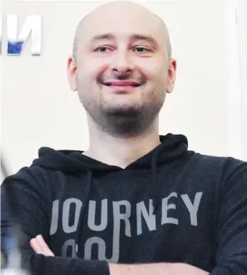  ?? PHOTOS: SERGEI SUPINSKY / AFP / GETTY IMAGES ?? Ukrainian officials admitted it orchestrat­ed the murder of anti-Kremlin journalist Arkady Babchenko in order to foil an attempt on his life by Russia, a stunning twist in a case that attracted global headlines.