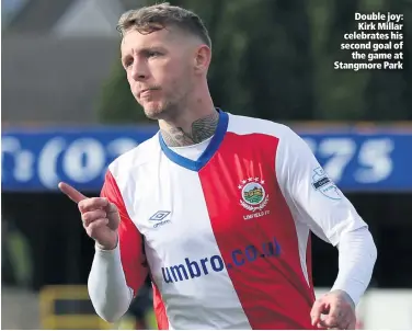  ??  ?? Double joy: Kirk Millar celebrates his second goal of
the game at Stangmore Park