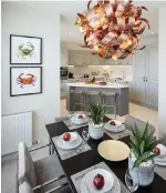  ??  ?? Clockwise from left: The kitchen and dining area of Hollybrook at Robswall; the sitting room and the exteriors of the scheme