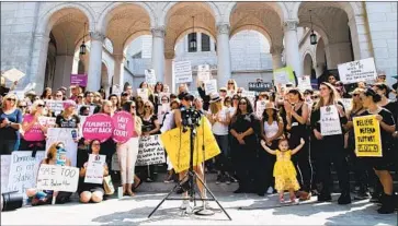  ?? Emma McIntyre Getty Images ?? TIME’S UP co-sponsored a rally at L.A. City Hall against then-Supreme Court nominee Brett M. Kavanaugh.