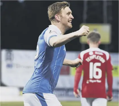  ??  ?? 2 Midfielder Liam Craig celebrates St Johnstone going ahead after only five minutes with an own goal from Hamilton’s Scott Mcmann.