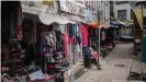  ?? ?? An empty shopping street in Kathmandu in October 2021