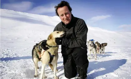  ?? Photograph: Reuters ?? David Cameron poses with huskies on Svalbard, Norway, on 20 April 2006.