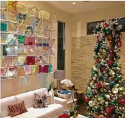  ?? Courtesyph­oto ?? This contempora­ry décor with colorful modern art dictates the bright colors on this Christmas tree.