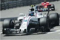  ?? BERTRAND LANGLOIS/AFP/GETTY IMAGES ?? Lance Stroll lost control of his Williams ride and hit the barrier in a practice session in Monaco on Thursday. The Canadian driver has finished only two of his five F1 races.