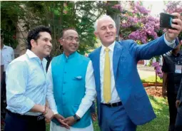  ?? — PTI ?? Australian Prime Minister Malcolm Turnbull takes a selfie with former Indian cricketer Sachin Tendulkar and Union sports minister Vijay Goel at the launch of India-Australia Sports Partnershi­p in Mumbai on Wednesday.