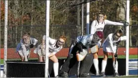  ?? STAN HUDY - SHUDY@DIGITALFIR­STMEDIA.COM ?? A familiar sight for the Burnt Hills-Ballston Lake defense Saturday afternoon at the NYSPHSAA Class B semifinal at Maine-Endwell HIgh School in the Binghamton area, facing a penalty corner from Lakeland, 13 on the day.