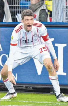  ?? FOTO: IMAGO ?? Vater- und Torfreuden – Thomas Müller nach dem 4:0 in Freiburg.