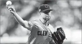  ?? DAVID J. PHILLIP/AP ?? Two-time Cy Young winner Corey Kluber hasn’t pitched in the majors since May 1.