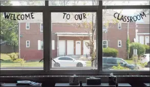  ?? Ned Gerard / Hearst Connecticu­t Media file photo ?? The windows of a kindergart­en class at Johnson School in Bridgeport on Aug. 27, 2020.