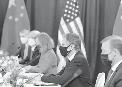  ?? FREDERIC J. BROWN/AFP ?? Secretary of State Antony Blinken, second right, joined by national security adviser Jake Sullivan, right, listen as they meet Chinese Communist Party foreign affairs chief Yang Jiechi and China’s State Councilor Wang Yi on Thursday in Anchorage, Alaska.