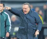  ??  ?? Fenerbahce coach Dick Advocaat reacts during a match.